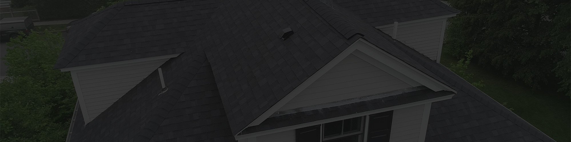 Newly repaired residential asphalt roof in Massachusetts
