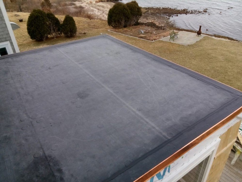 Residential garage flat roof replacement in Massachusetts