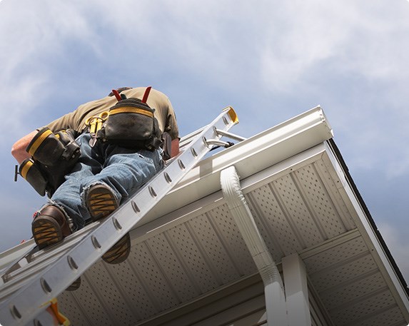 roof inspector in Warwick inspecting a home