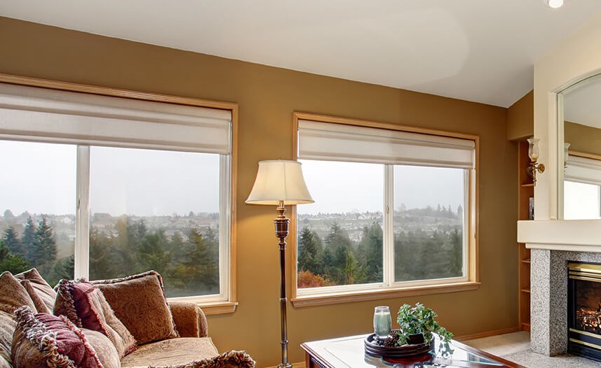 Double picture windows in living room in New Bedford area home